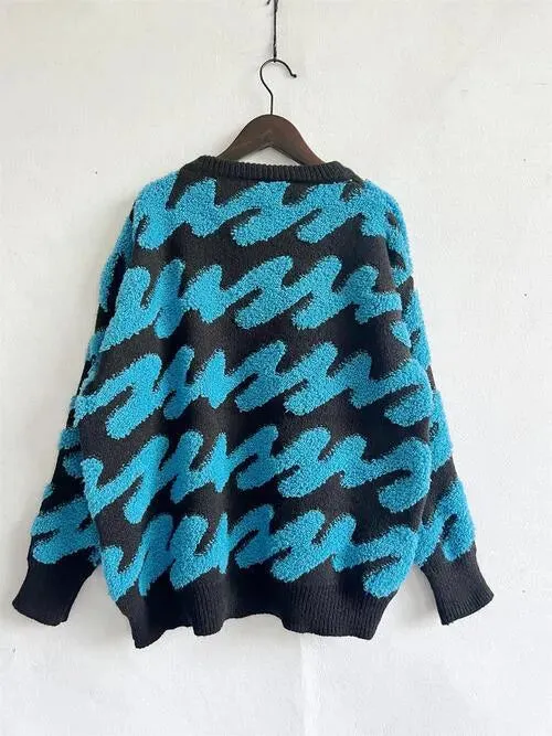 Get Cozy and Chic: Women's Dropped Shoulder Sweater with Squiggle Pattern