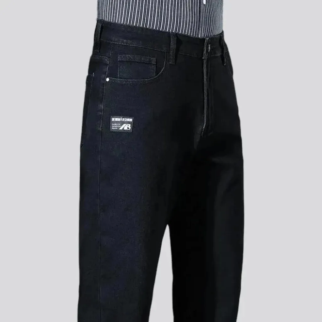 High-rise tapered jeans for men